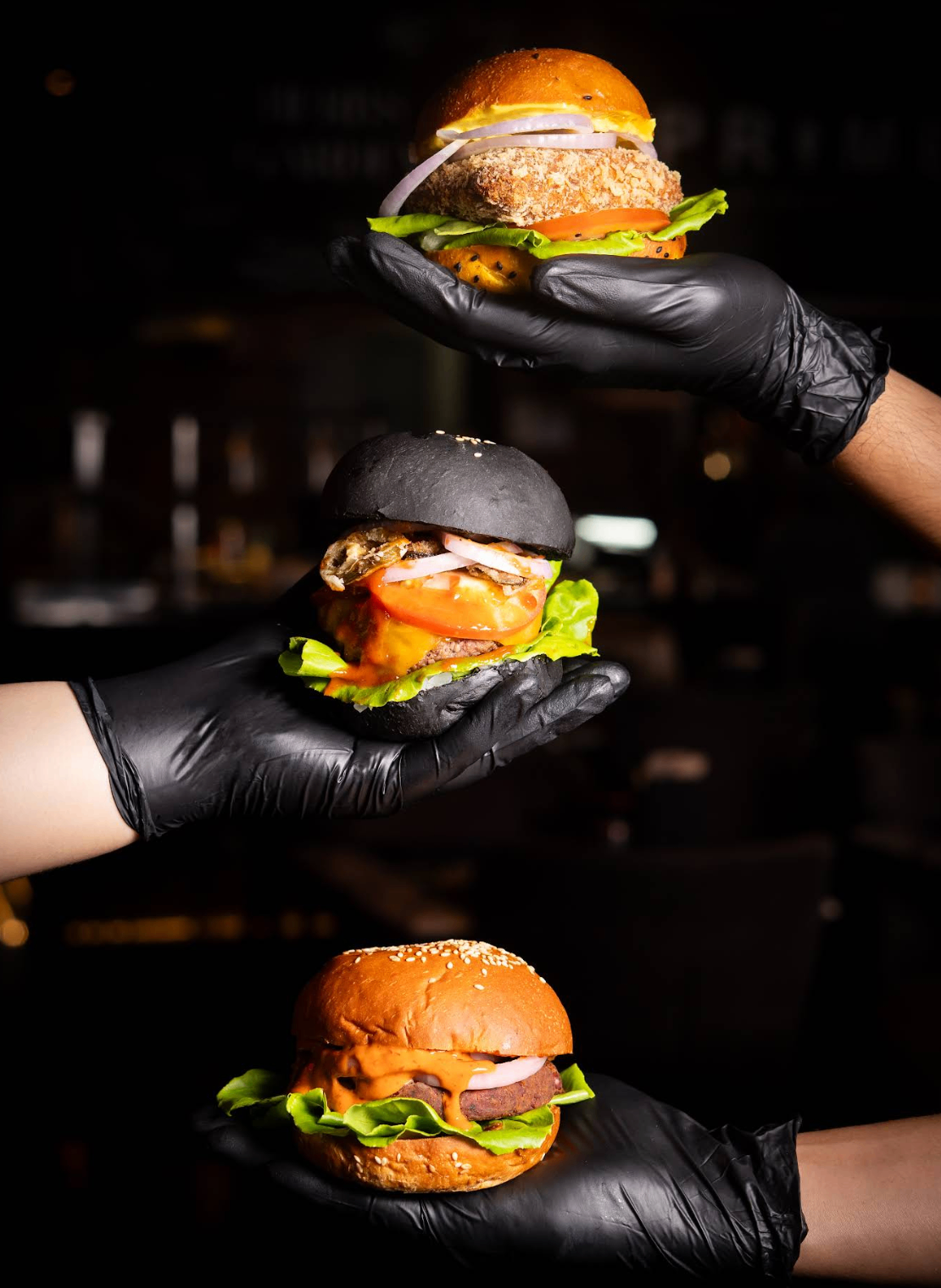 Signature burgers presented dramatically at PRIME