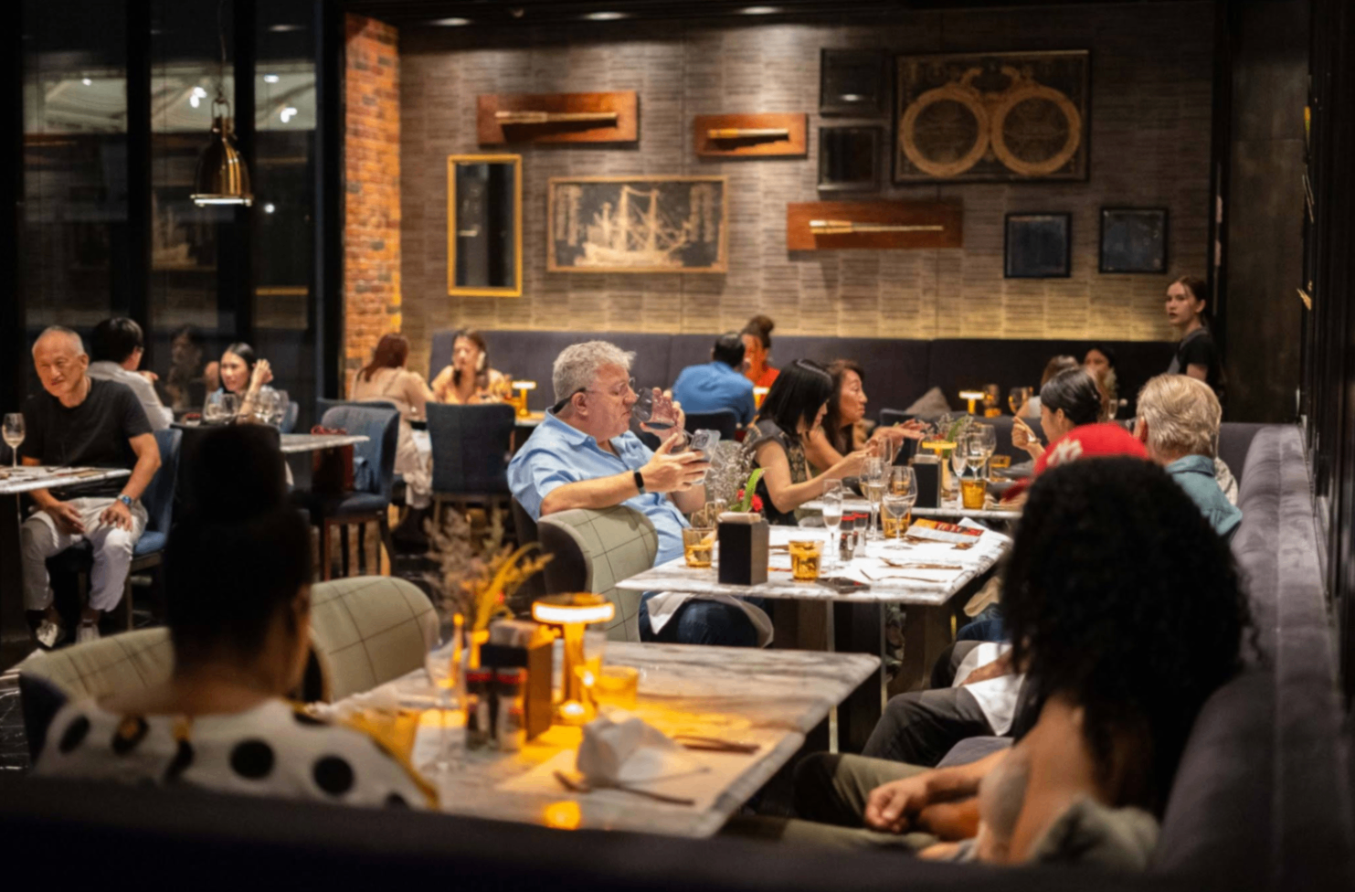 Guests dining at PRIME in the evening